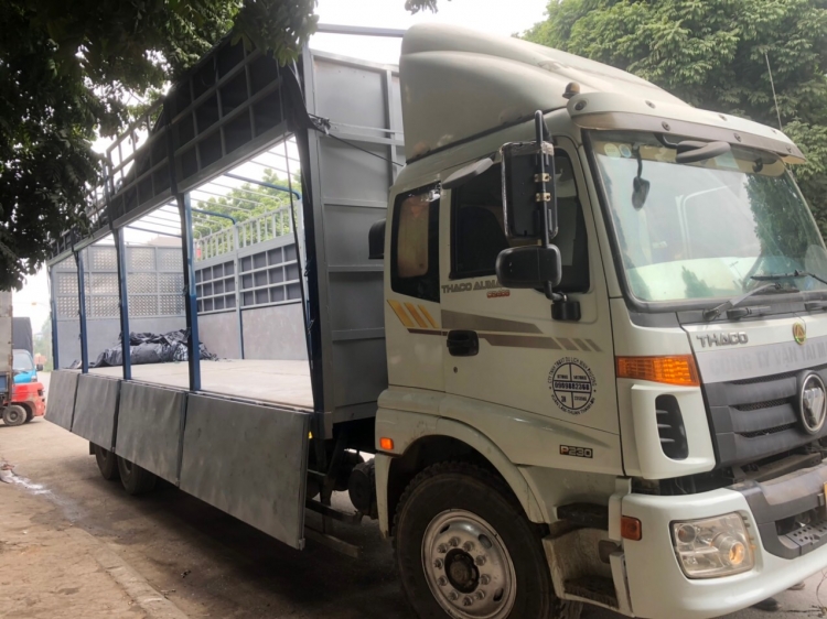 Nhận Vận chuyển hàng hóa với xe thùng bạt dài 9m7 mở sườn 
